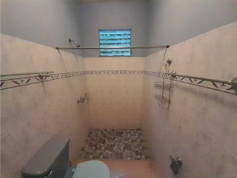 Traditional kitchen with tile backsplashes wooden cabinets Chitré Panama house