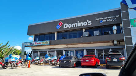 Facade of Plaza LG commercial center with Domino's Pizza signage in Vista Alegre Arraiján Panama