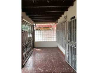 Empty room with barred window tiled floor Las Tablas traditional home for sale