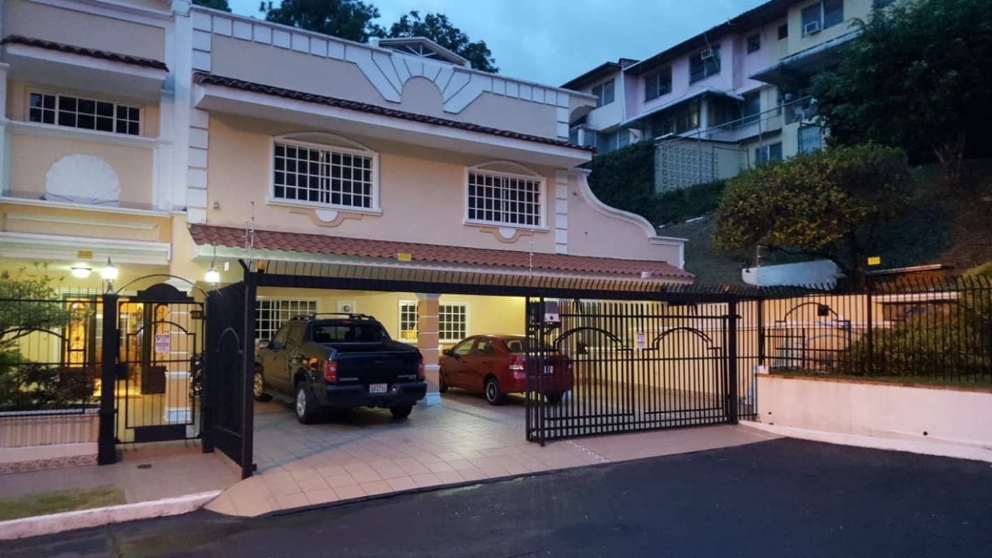 Two-story townhouse with decorative facade and secure gate Nuevo Altos de Miraflores