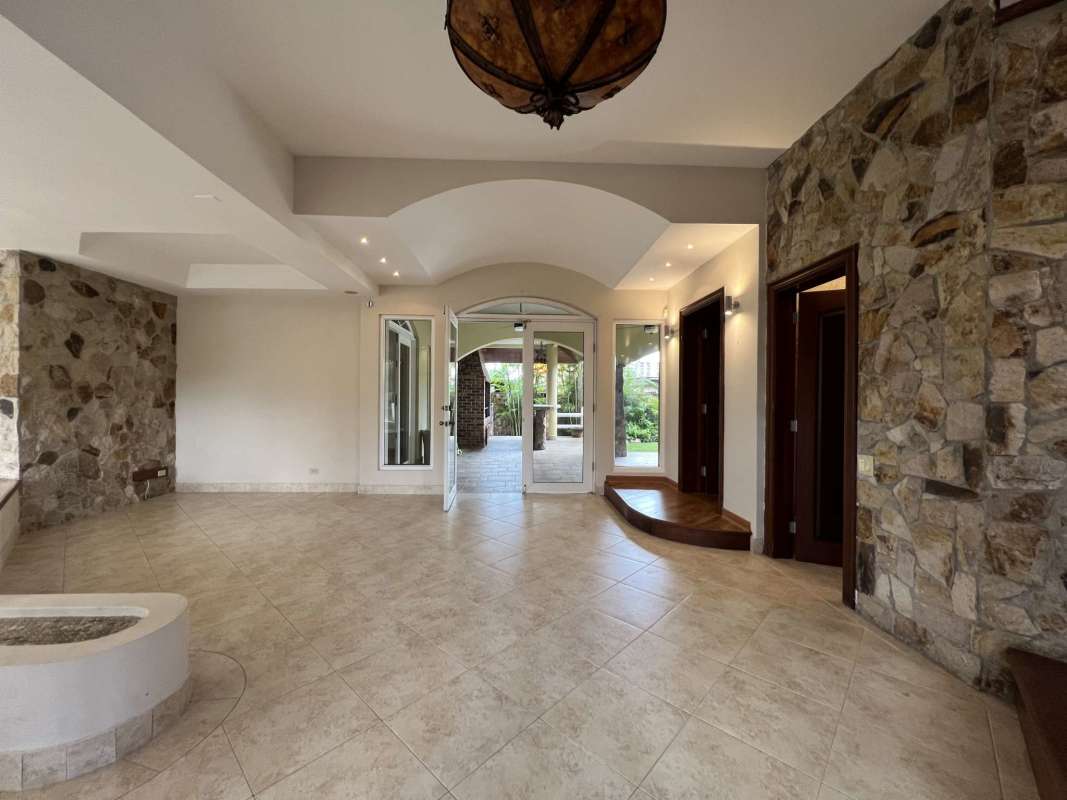 Large living area with recessed lighting, wood floor, luxury home Altos del Golf Panama City