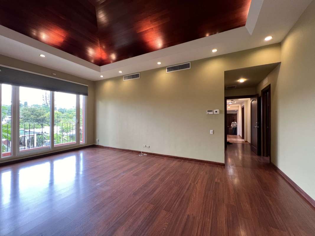 Two-story Mediterranean style house with arched windows, garden luxury home Altos del Golf Panama City