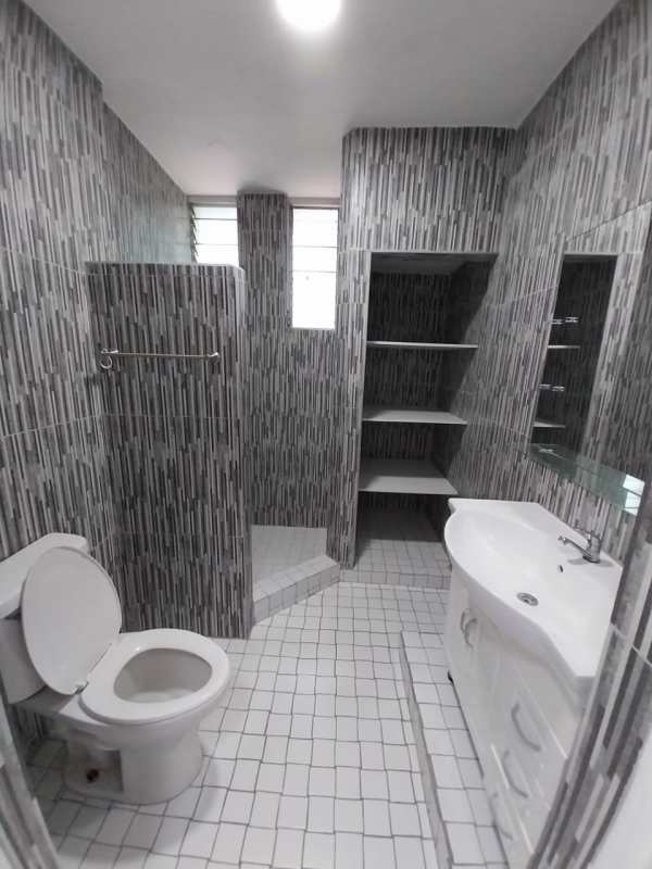 Studio bedroom area with split AC, wood floors, large windows, PH Vista Plaza Panama City