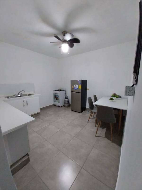 Modern bathroom with shower, built-in shelves, gray tiles at PH Vista Plaza Vía Argentina Panama