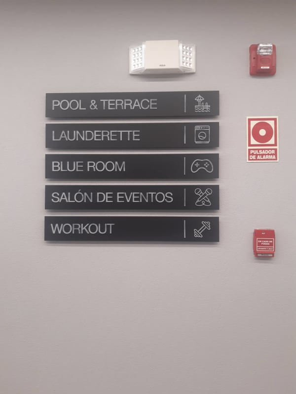 Signs for pool gym event hall laundry area PH Van Gogh El Cangrejo Panama