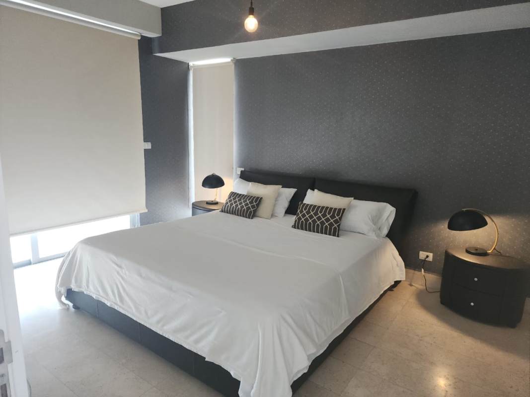 Luxury dining space with marble feature and art in PH Yoo Panama