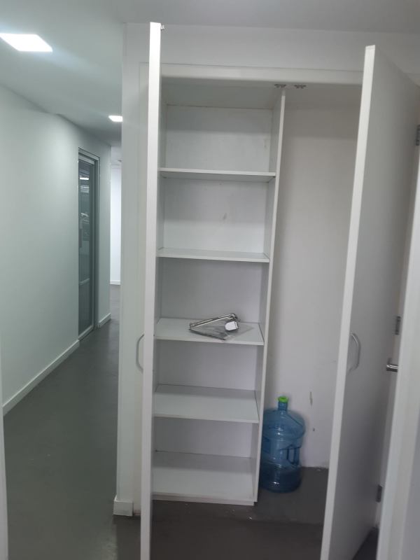 Hallway with built-in storage shelving commercial premise PH Royal Center Panama