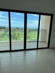 Spacious living and dining with glass doors to terrace Vista Mar beachfront condo Panama