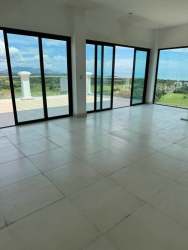 Modern kitchen island with stone countertops and ocean views PH Las Olas II Panama
