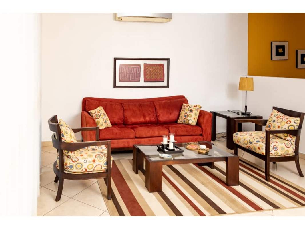 Modern kitchen with granite countertop, appliances and tile flooring in PH Riverside Tower Coco del Mar