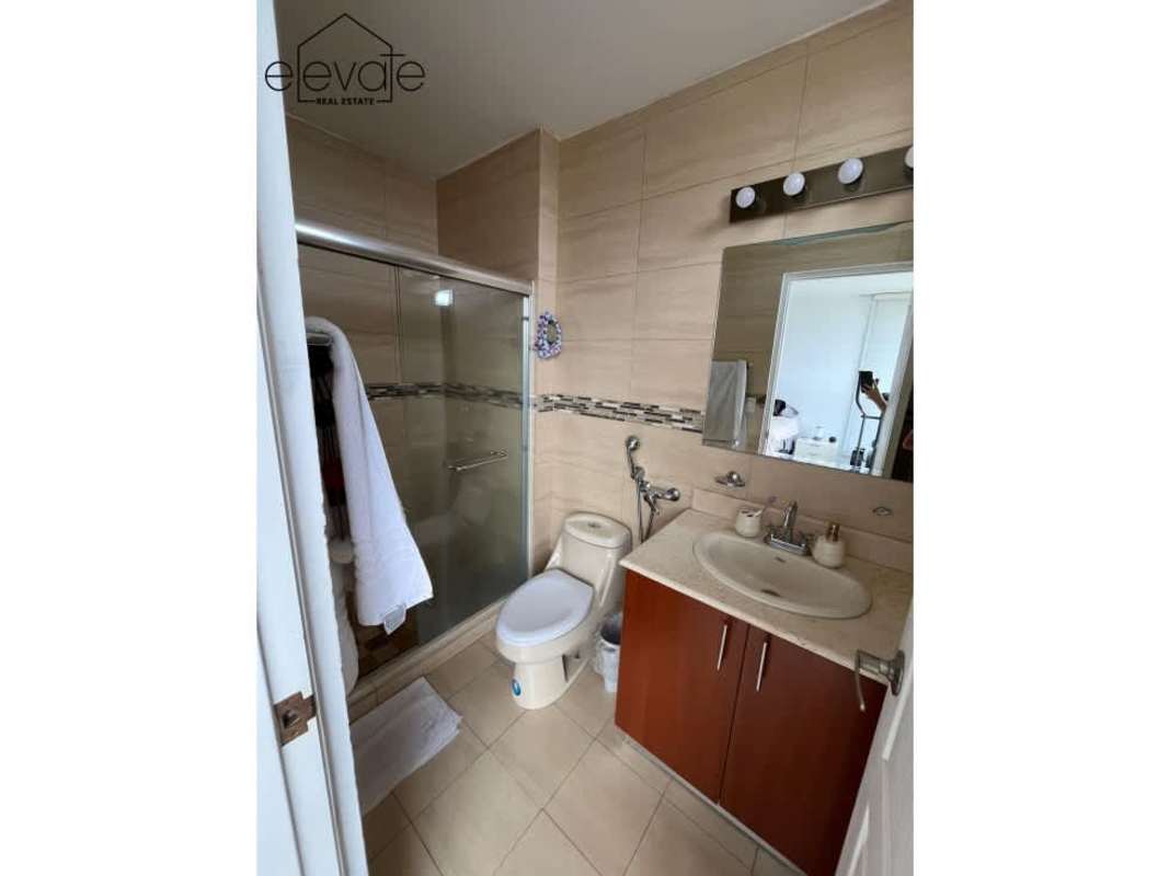 Contemporary kitchen with grey cabinets and laundry appliances PH San Francisco Bay Panama