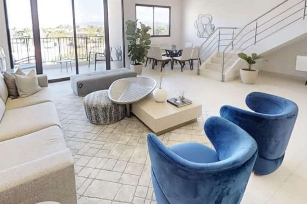 Modern minimalist kitchen with island, stainless appliances in Casa Bianca Costa del Este Panama