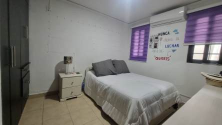 Second bedroom with light windows and closet space Costa Verde Panama house for sale