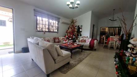 Living room with festive holiday decorations in Sunset Hills family house for sale La Chorrera