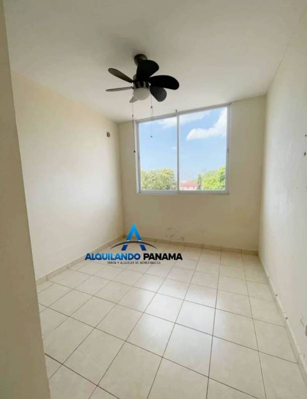 Laundry room with utility sink and window Betania Panama apartment for sale