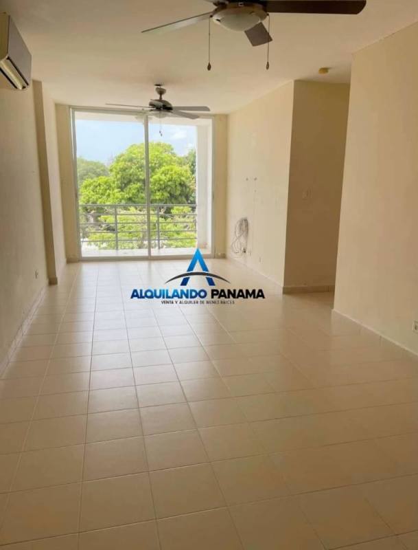 Bedroom with large window, built-in closet, ceiling fan, ceramic floors in Panama apartment