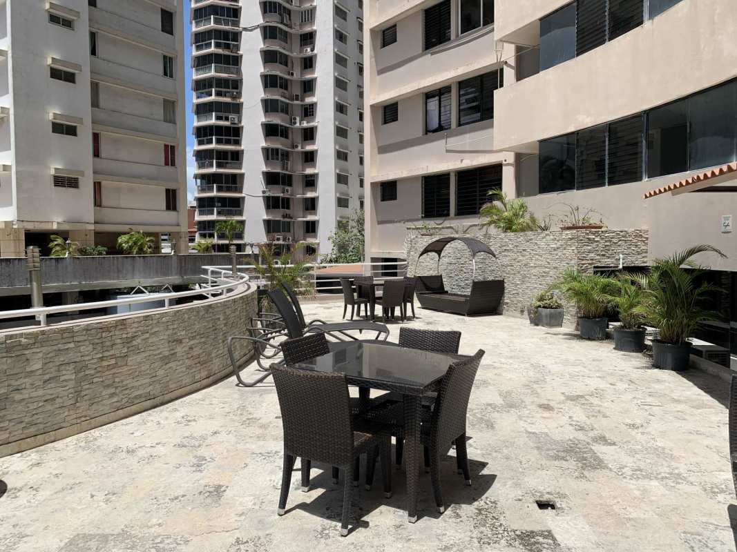 Outdoor pool area with jacuzzi sun loungers PH Royal Princess Panama City