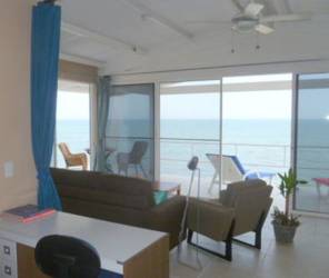 Expansive terrace with panoramic Pacific Ocean view at PH Solymar San Carlos beachfront villa