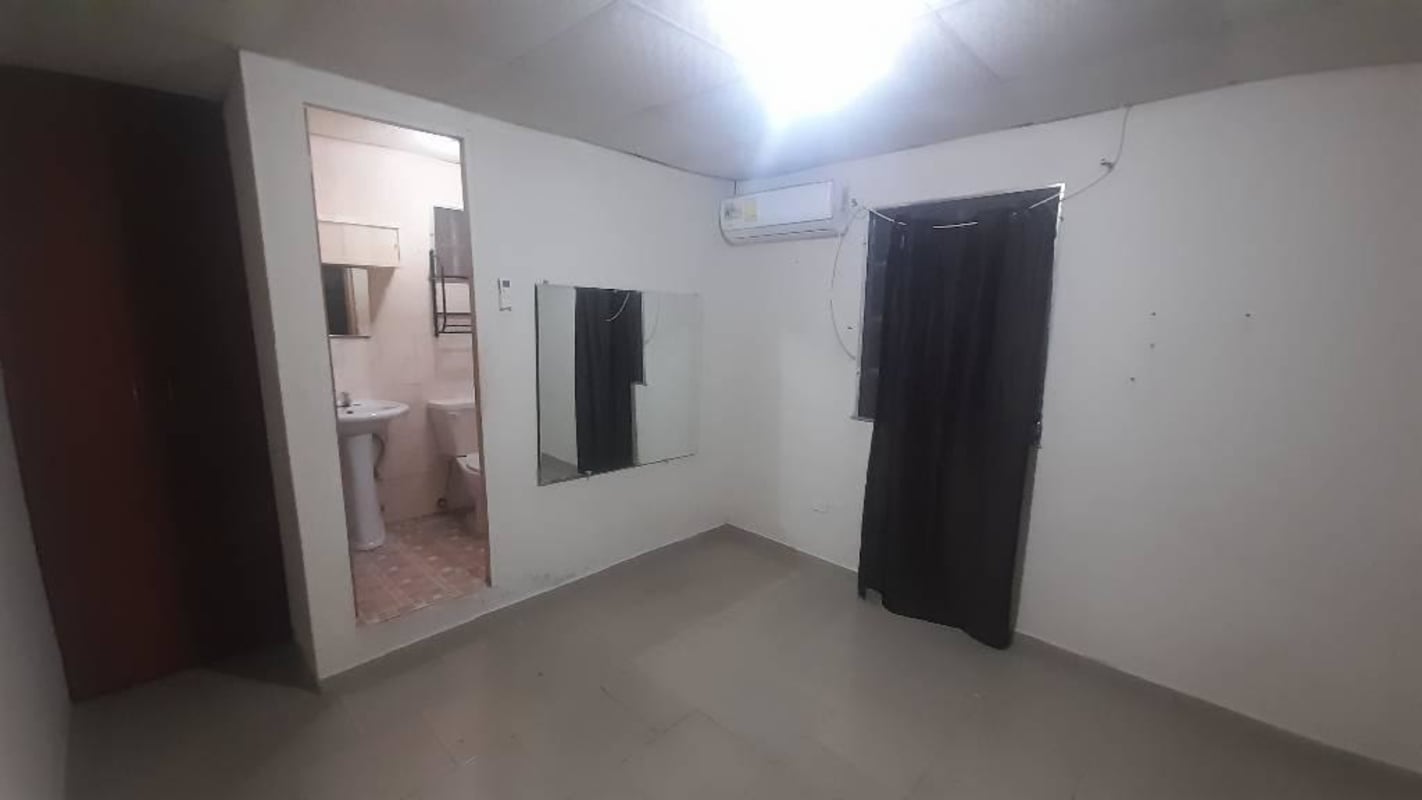 Simple tiled bathroom pedestal sink shower with curtain Ciudad Radial Panama apartment for rent