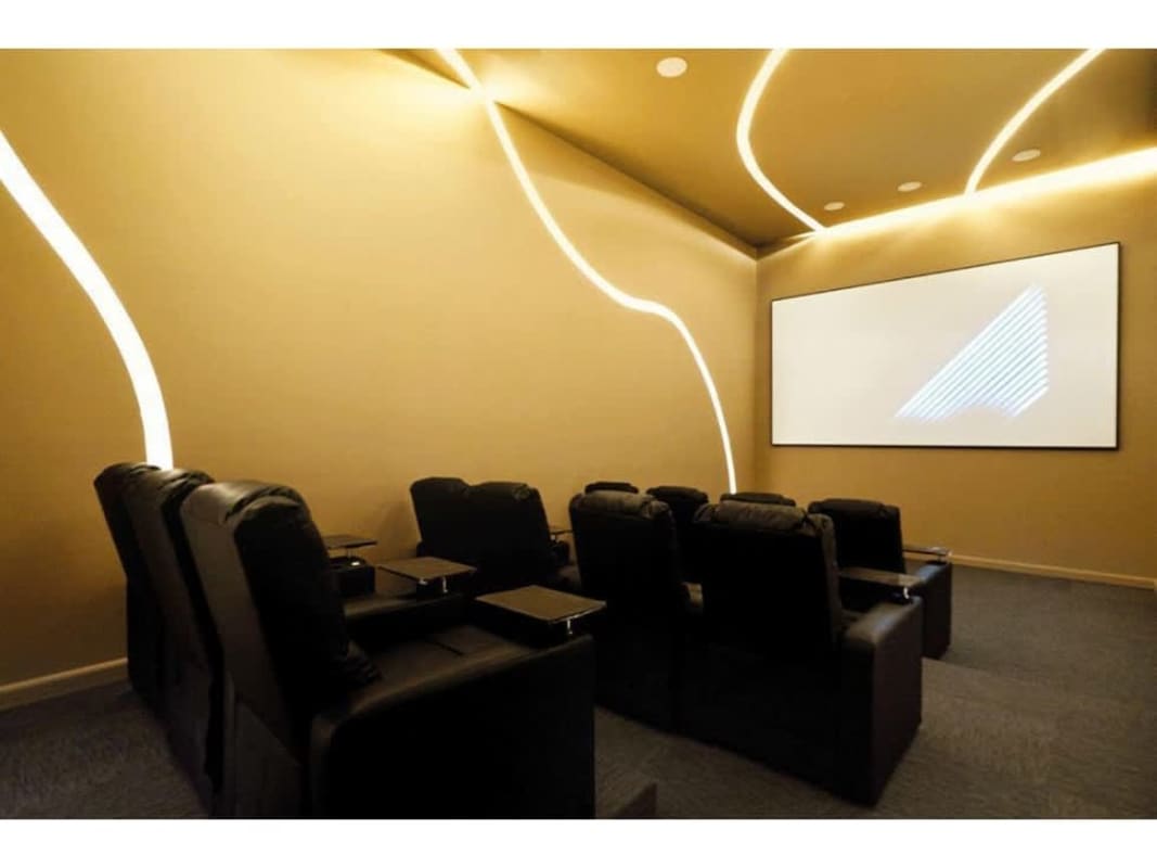 Modern bathroom with marble finish glass shower at Victory Wellness Tower Panama