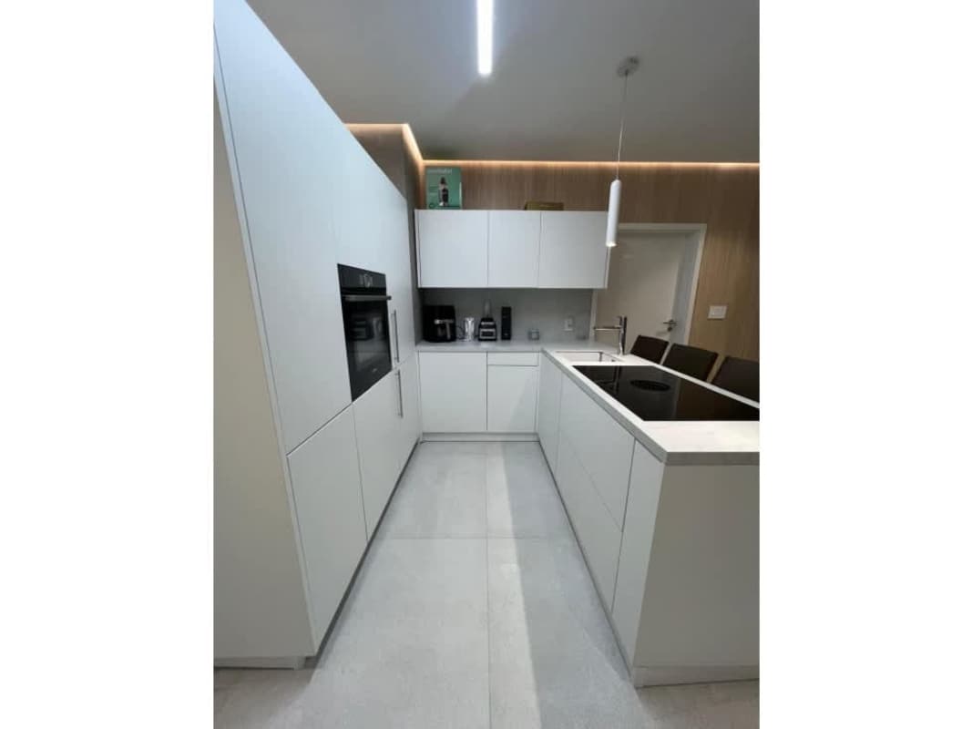 Spacious living room with floor-to-ceiling glass and city ocean views at Victory Wellness Tower Panama