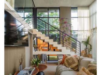 Modern living room with tall windows and elegant decor in PH MidTower Panama