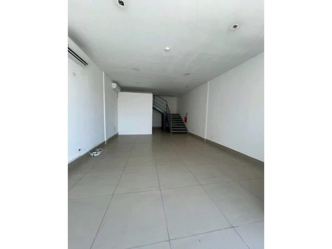 Empty commercial interior with tiled floor, recessed lighting, and staircase in Plaza 76 San Francisco Panama