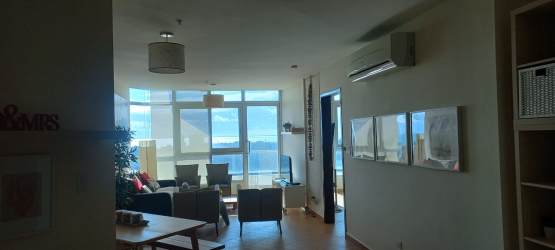 Bedroom with large window featuring panoramic Pacific Ocean view in Coronado Golf Panama