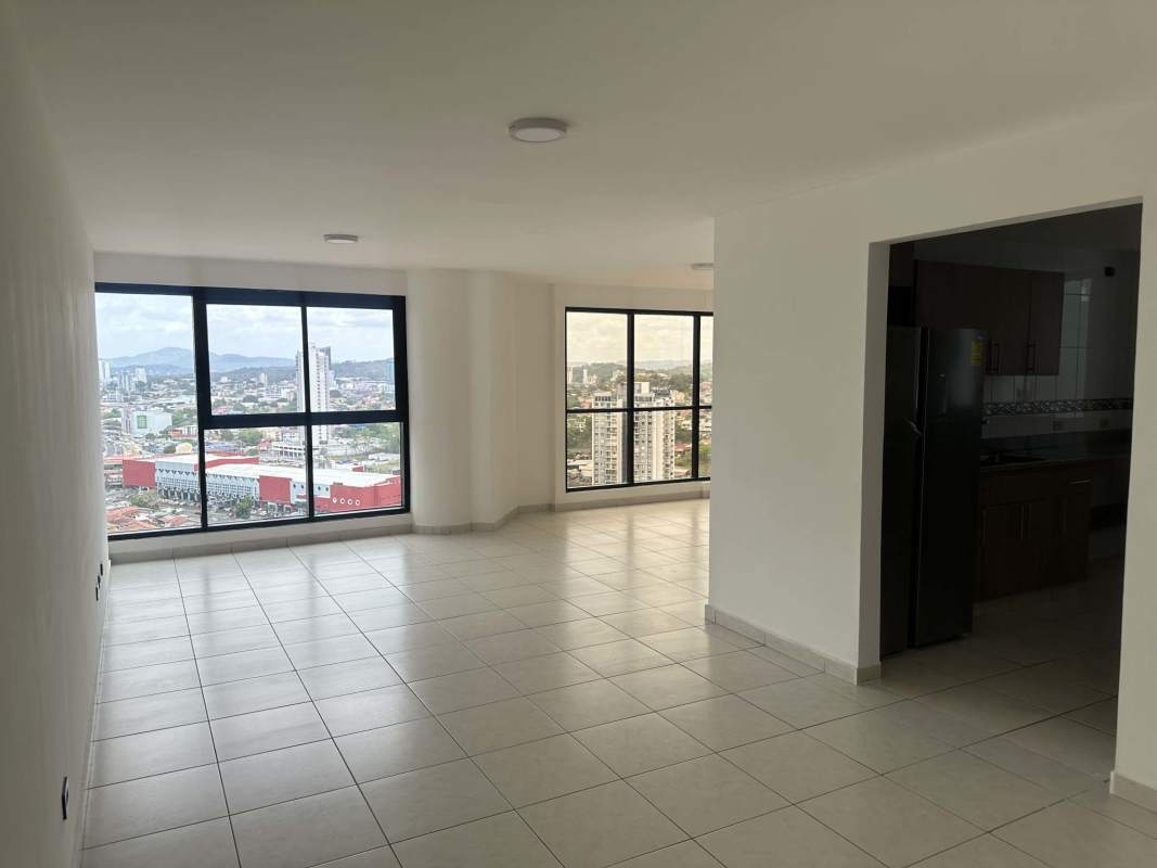 Bright living room with large windows showcasing panoramic views in PH Sky View Panama City