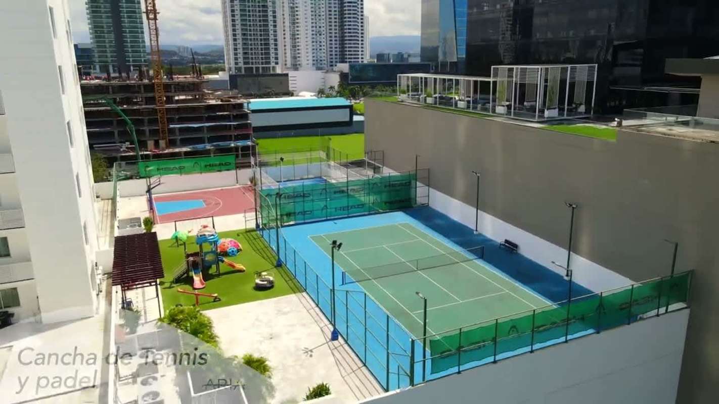 Modern bathroom with double sinks, marble countertop and large mirror in PH Aria Costa del Este Panama