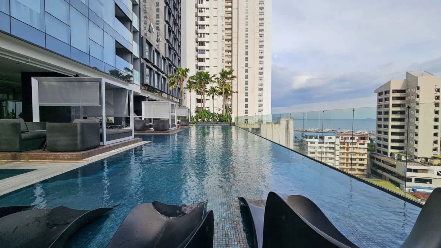 Rooftop infinity pool with panoramic ocean and city views at PH BICSA Tower Panama City