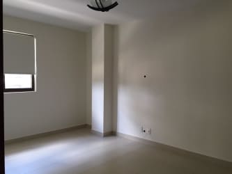 Secondary bedroom bright with window and built-in closet in River Valley Panama Pacifico apartment