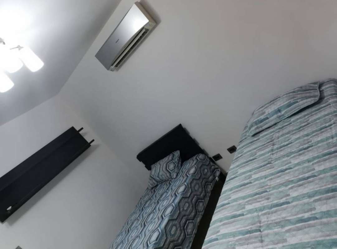 Contemporary bathroom with mosaic tile, vessel sink, and large mirror in PH El Cangrejo City Center