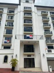Large bright living room with ceramic floors and sliding doors to balcony Embassy Village Clayton Panama