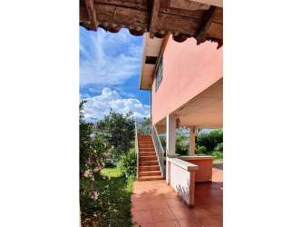 Covered outdoor patio tiled with pillars at rural farmhouse Los Santos Panama