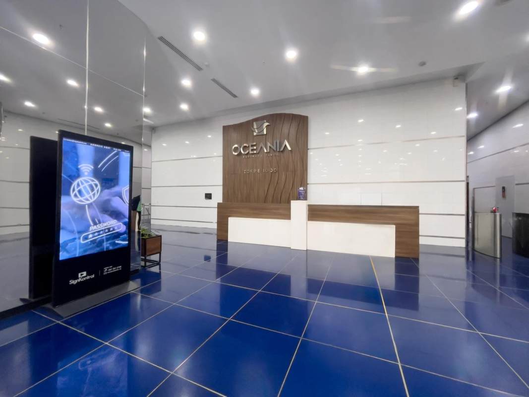 Modern stainless steel elevator lobby with glossy tile floors in Oceania Business Plaza in Panama