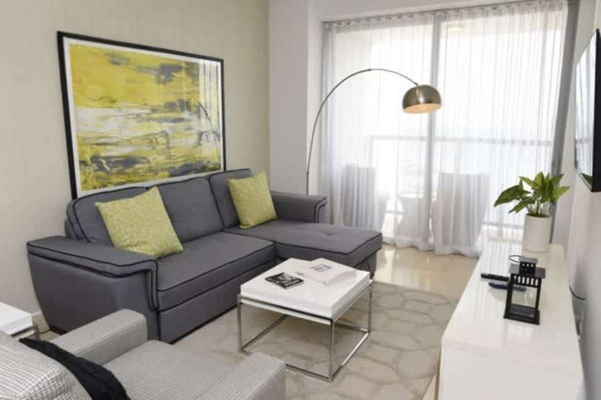 Modern minimalist bedroom with ocean views and high-end finishes at Yoo Panama