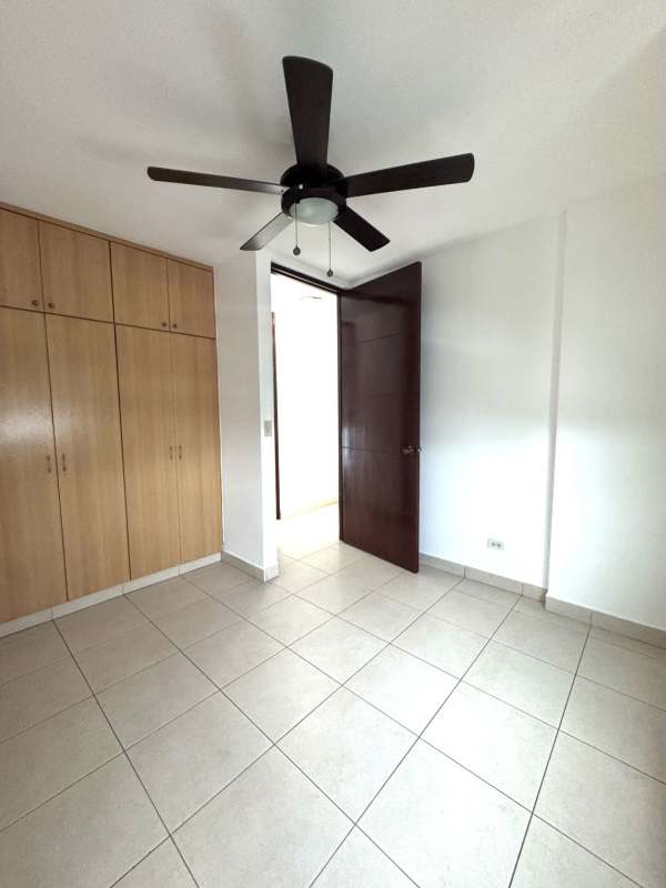 Bedroom with built-in closet, tile floor, ceiling fan and AC ready in PH San Francisco Vista Panama