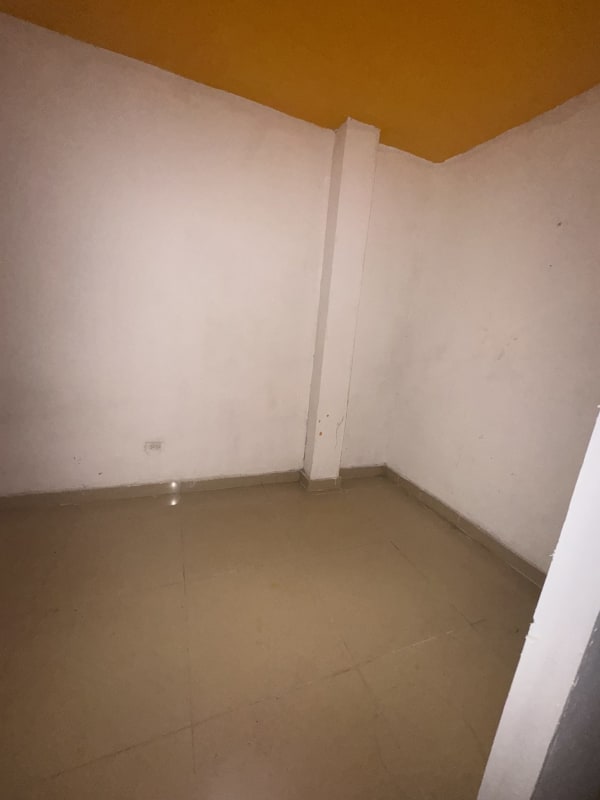 Utility corridor with tiled floor and small wash sink in PH Las Quintas Brisas del Golf Panama