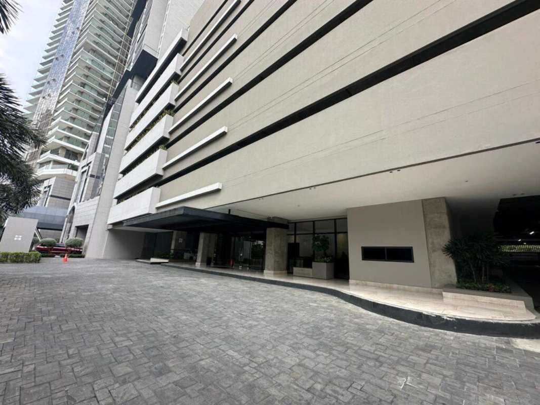 Colorful outdoor children's playground with wood deck at PH Albatross Santa María Panama