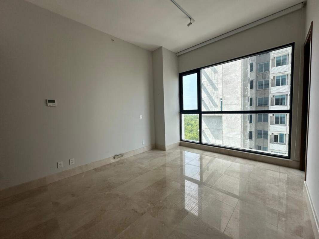 Large balcony terrace with sweeping views of golf course and Pacific Ocean at PH Albatross Panama City