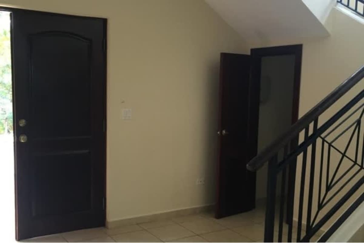 Kitchen with granite countertop, cabinets and tile backsplash Renovated for rent house Clayton Panama