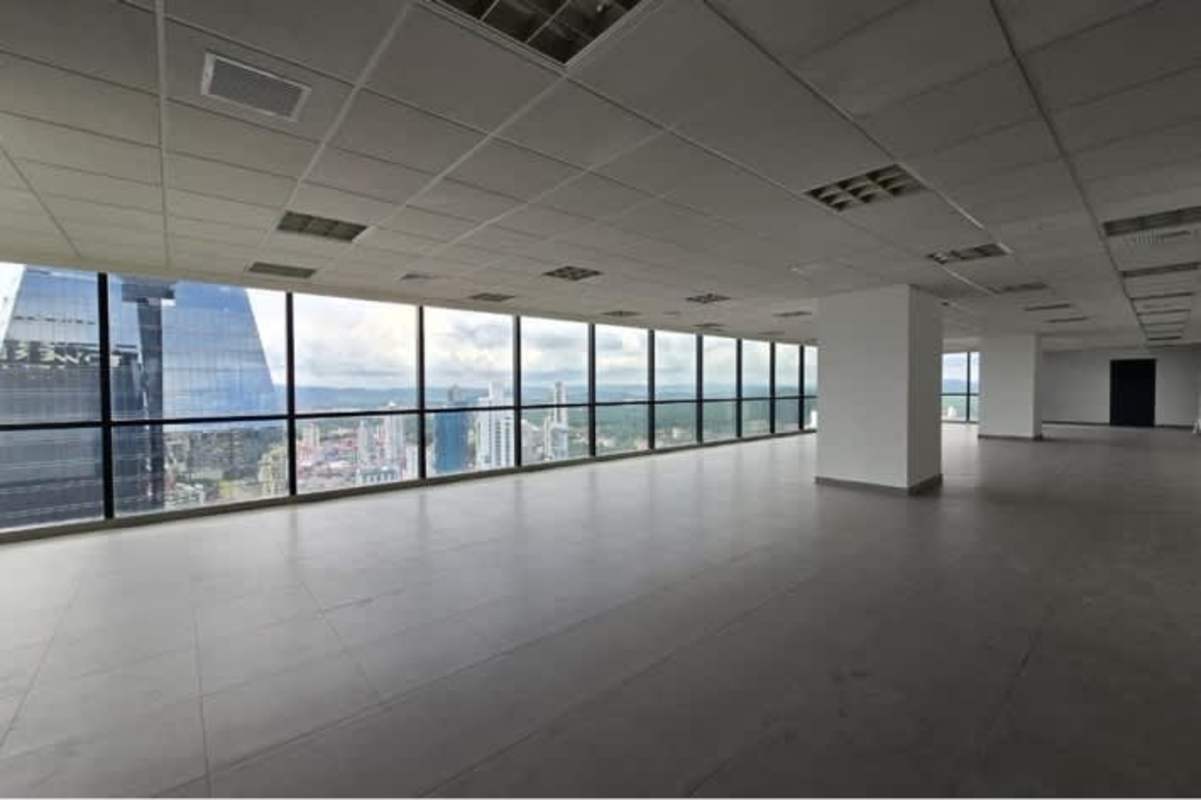 Modern empty office floor with panoramic windows for lease in PH BICSA Tower