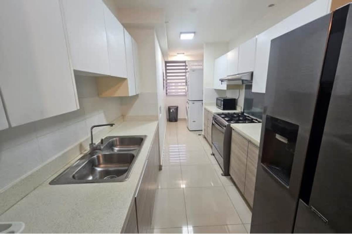 Bright open-plan living and dining area with balcony access PH Vista Balboa Panama