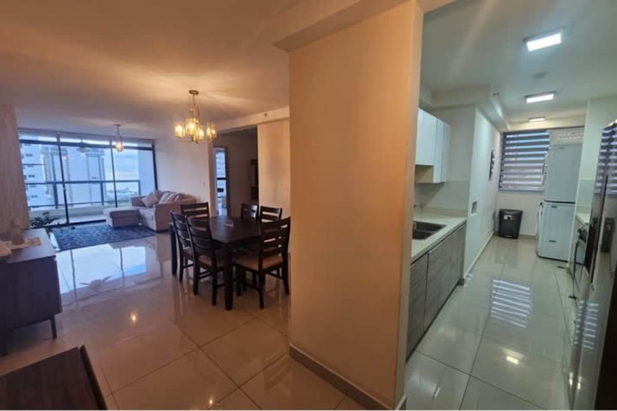 Master bedroom with large windows and ocean views at PH Vista Balboa in Bella Vista Panama