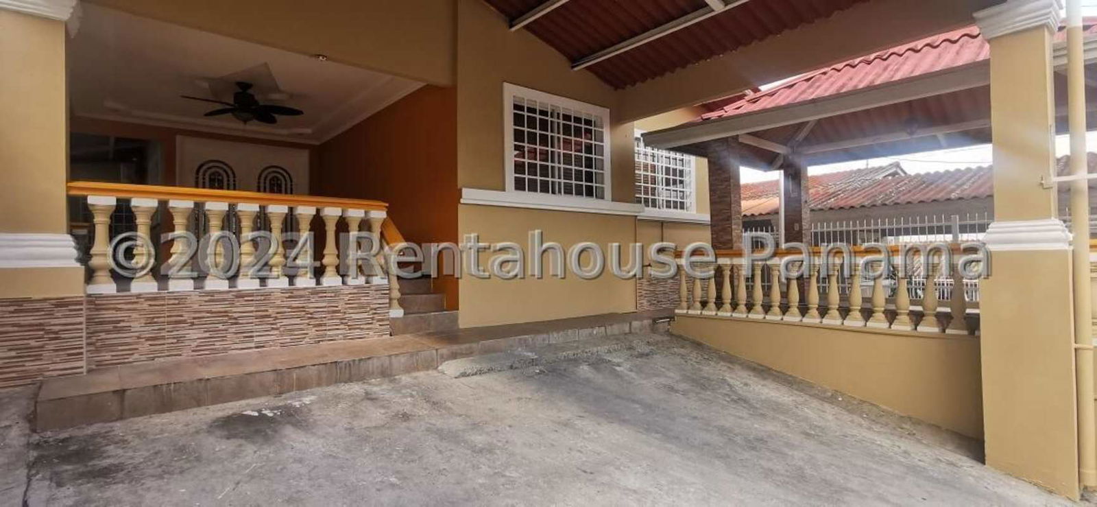 Elegant foyer double entry doors ceramic floors Villa Zaita Panama duplex house
