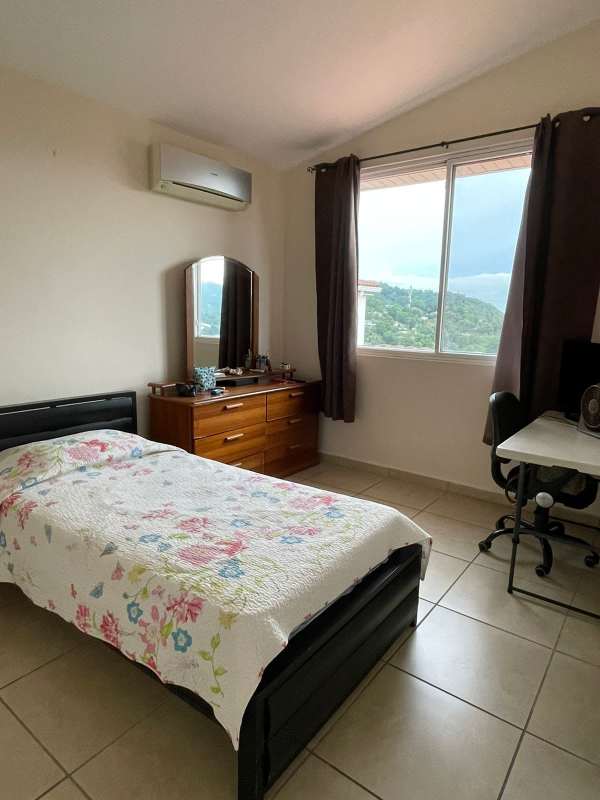 Bedroom with balcony access, built-in wardrobe, AC, ceramic tile floor in PH Brisas Heights Brisas del Golf