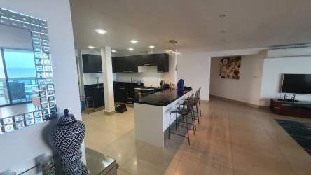 Modern kitchen with breakfast island and appliances in beachfront condo Coronado Panama