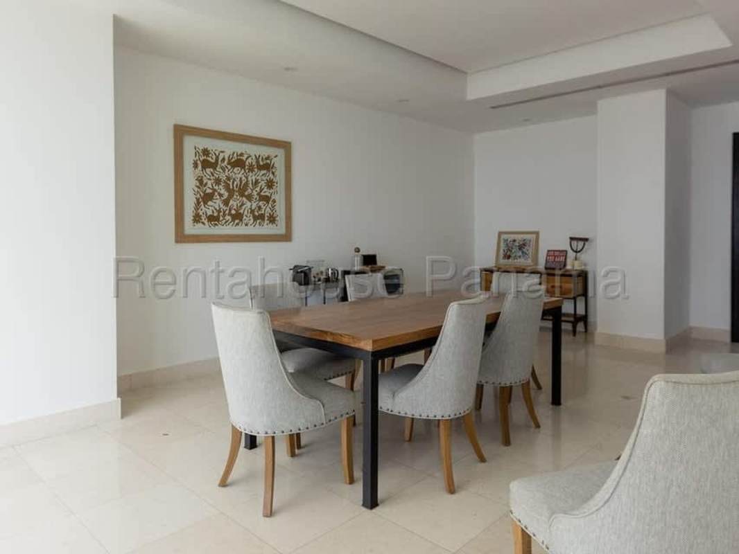 Spacious kitchen with granite countertops, island, stainless appliances in PH Ocean One Costa del Este Panama