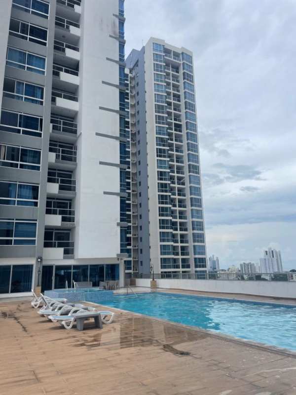 Outdoor swimming pool with sundeck at PH Vista Park Towers in San Miguelito Panama